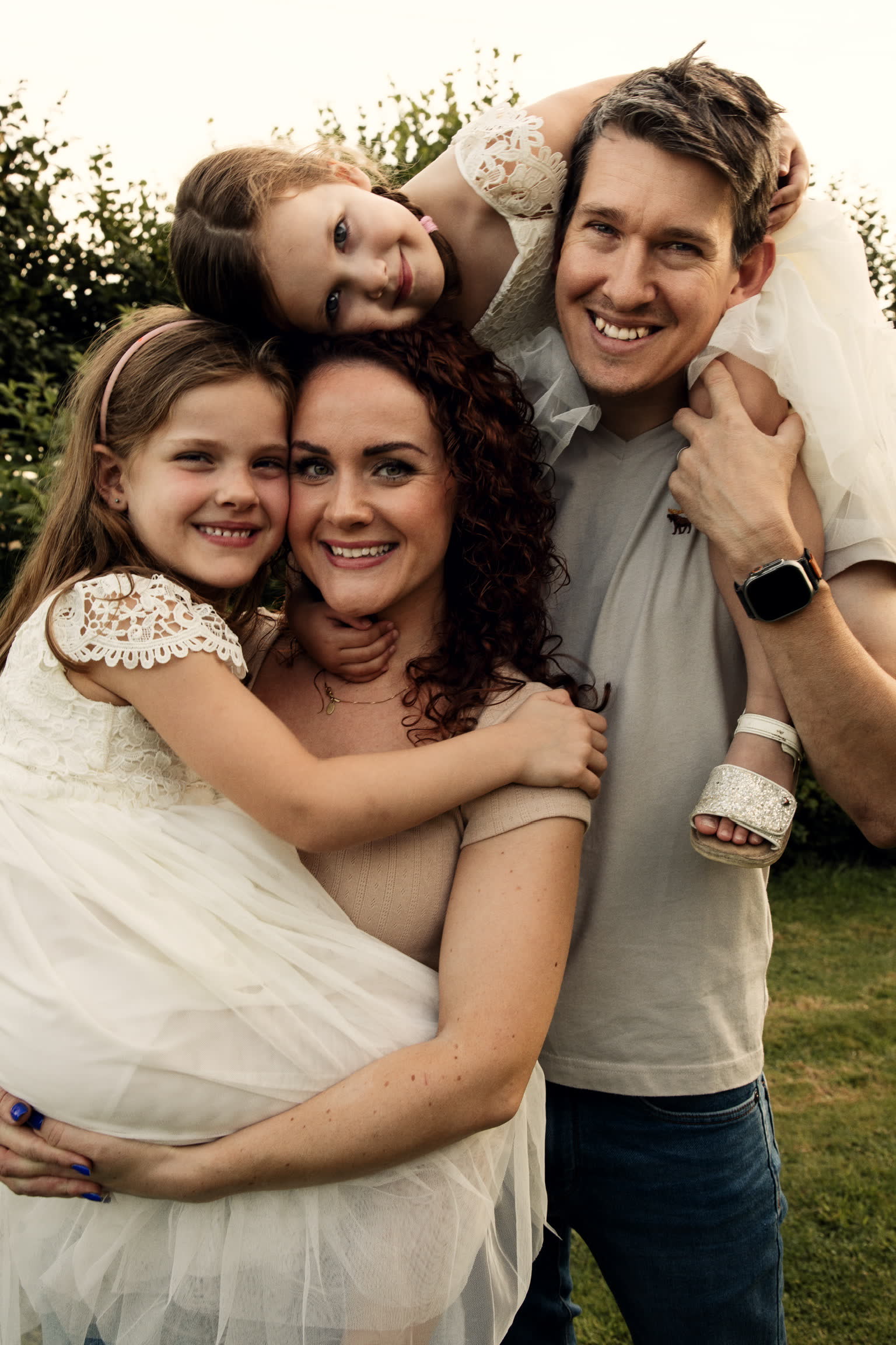 Kayleigh with her husband and two daughters