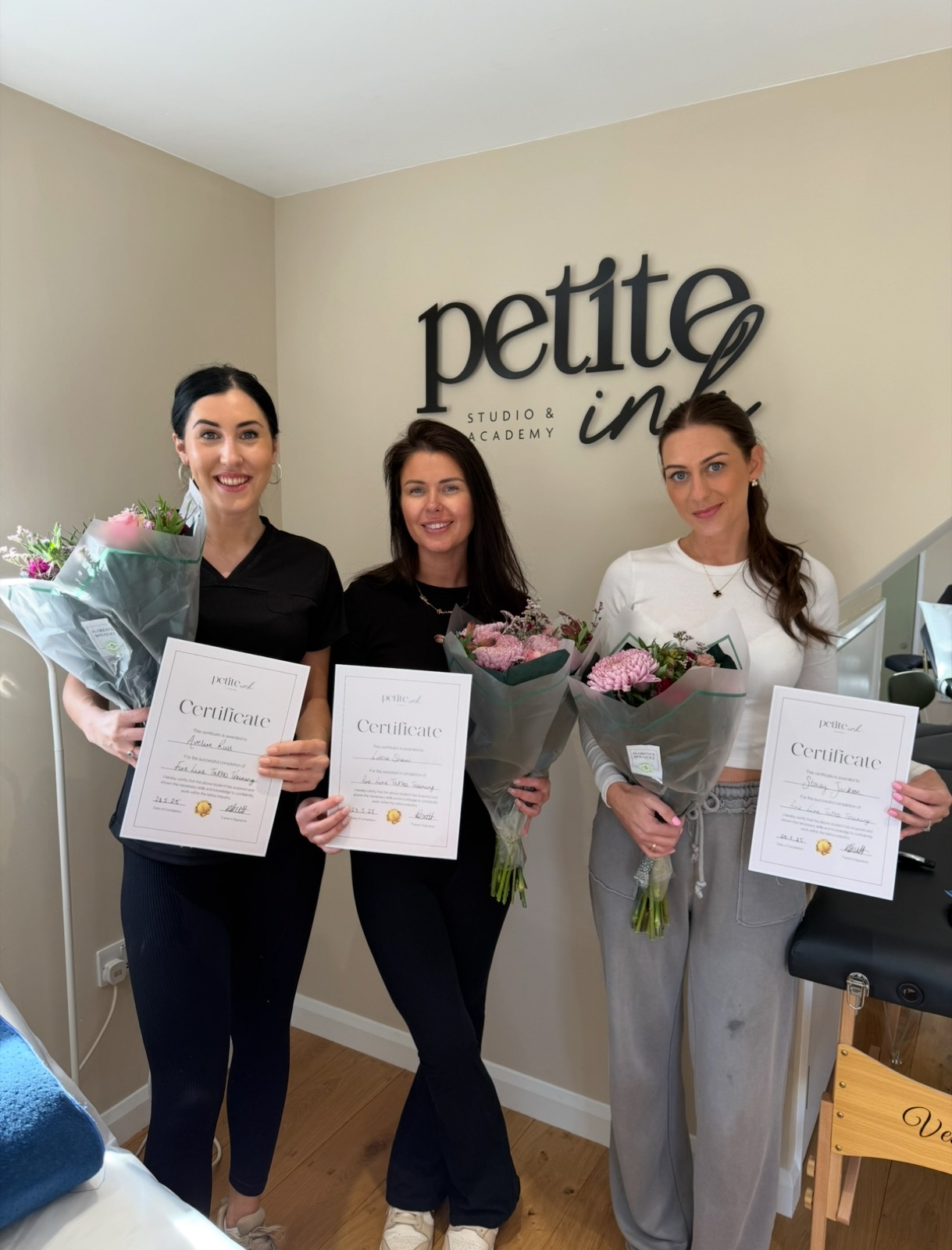 Petite Ink graduates after completing the training