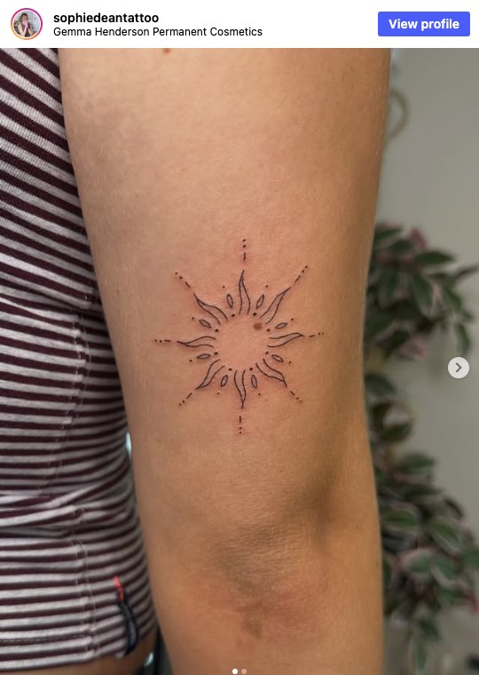 Instagram post by @sophiedeantattoo at Gemma Henderson Permanent Cosmetics: a fine line sunshine piece on an upper arm